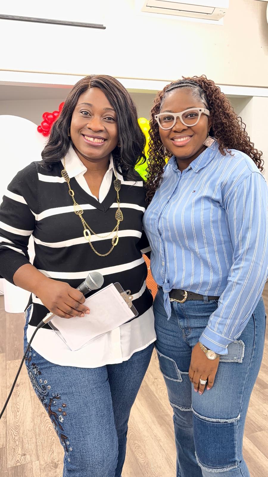 Bhee standing with a guest at an event